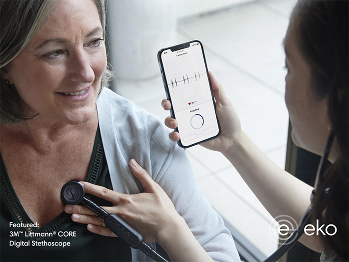 Clinician listens to woman's heart using 3M™ Littmann® CORE Digital Stethoscope